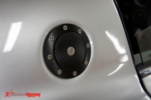 Lotus Exige (fuel lid wrapped in CF wrap & bezel wrapped in brushed black metal)