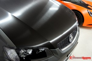 VE Bonnet refinished with brushed black aluminium vinyl wrap