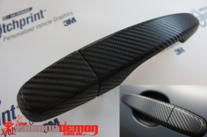Carbon fibre door handle wrap